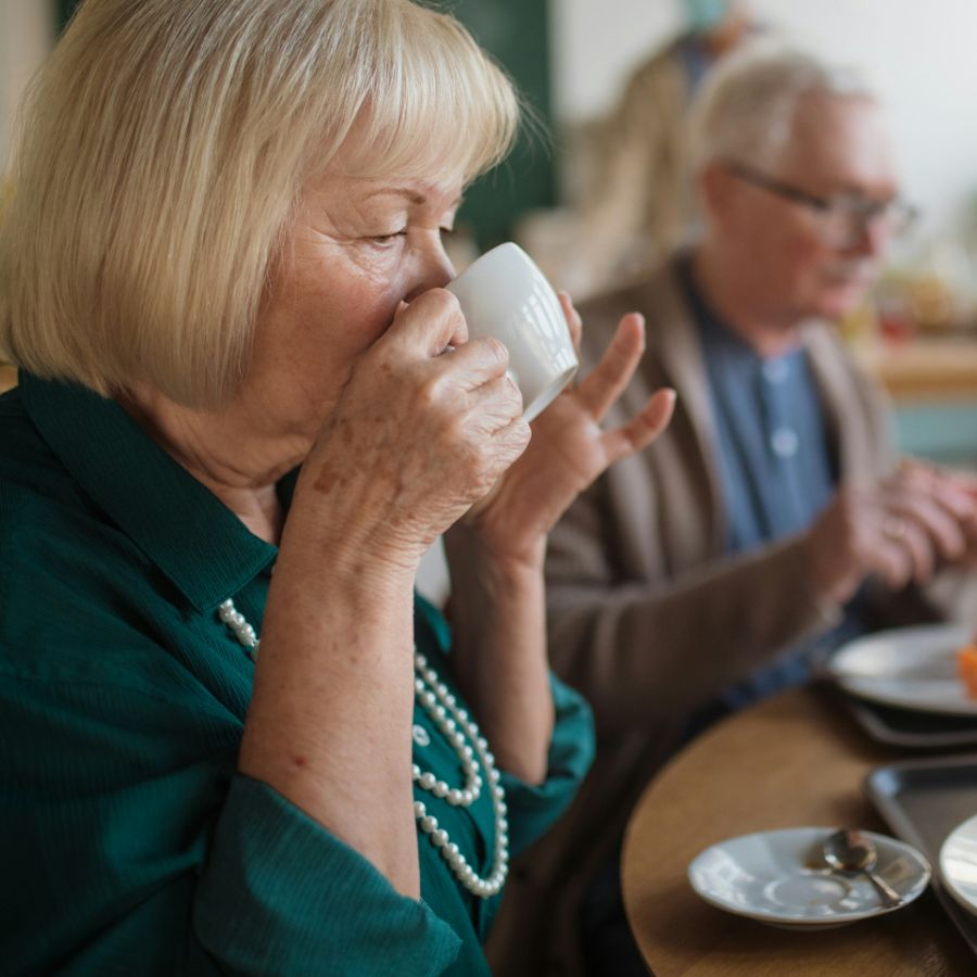 A resident enjoying a cup of tea on Respite Care at Riseley House Respite Care Home in Macclesfield