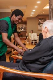 A cup of tea served with a biscuit at Riseley House Care Home in Macclesfield - Care Jobs in Macclesfield