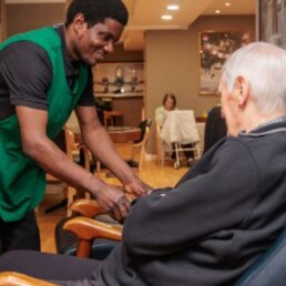 A cup of tea served with a biscuit at Riseley House Care Home in Macclesfield - Care Jobs in Macclesfield